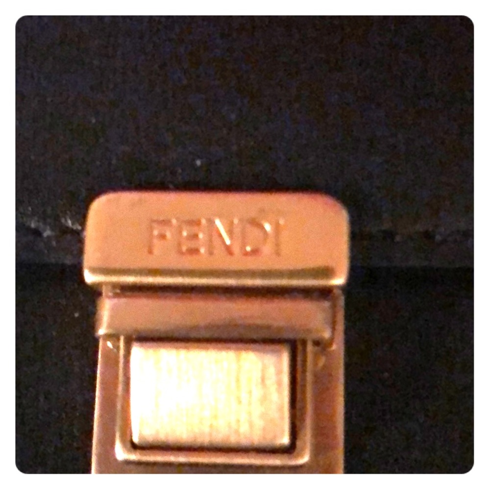 Pre-owned Fendi wristlet in pristine condition.